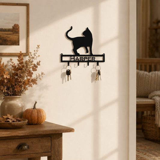 Personalized Matte Black cat key holder with four hooks in a warm farmhouse entryway decorated for early fall