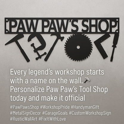 Decorative metal sign with tools and 'PAW PAW'S SHOP' text on a gray background
