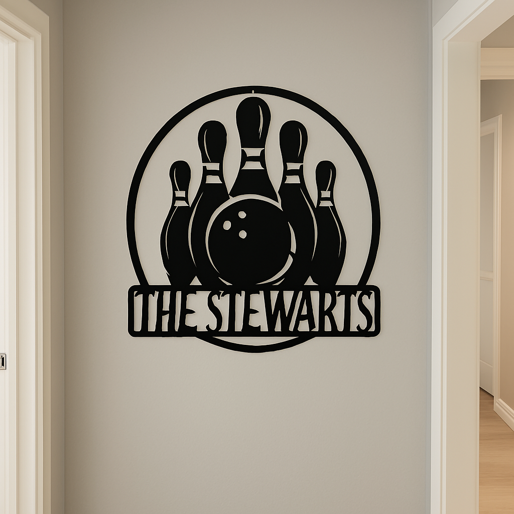 Black metal wall art with bowling design and 'THE STEWARTS' text on a beige wall.