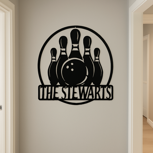 Black metal wall art with bowling design and 'THE STEWARTS' text on a beige wall.