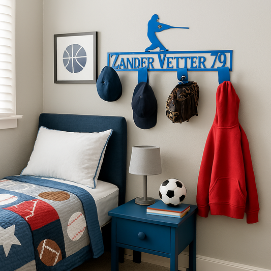 Children's bedroom with sports-themed decor, including a bed, nightstand, and wall hooks with baseball-themed items.