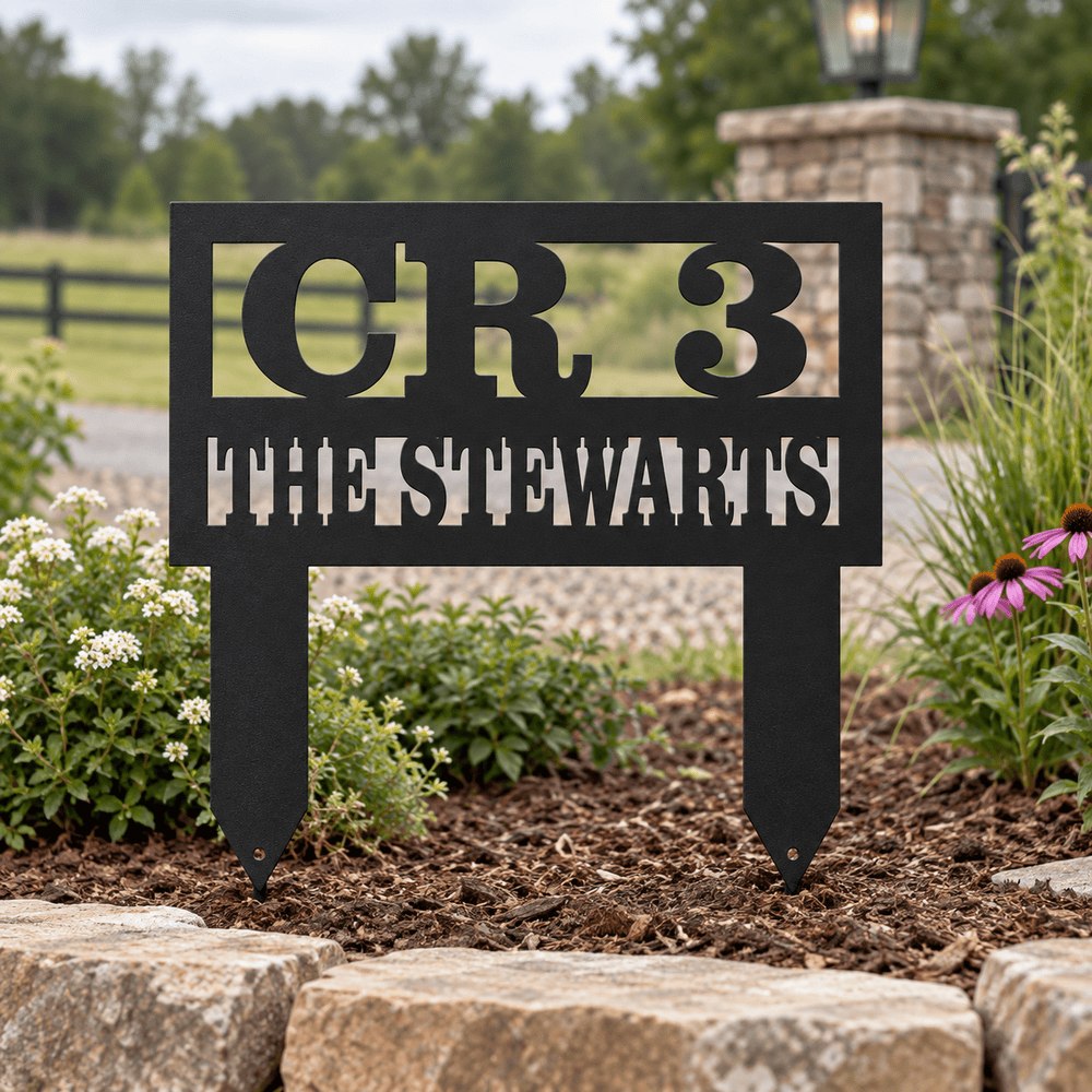 D77 personalized family road sign in a landscaped country entrance