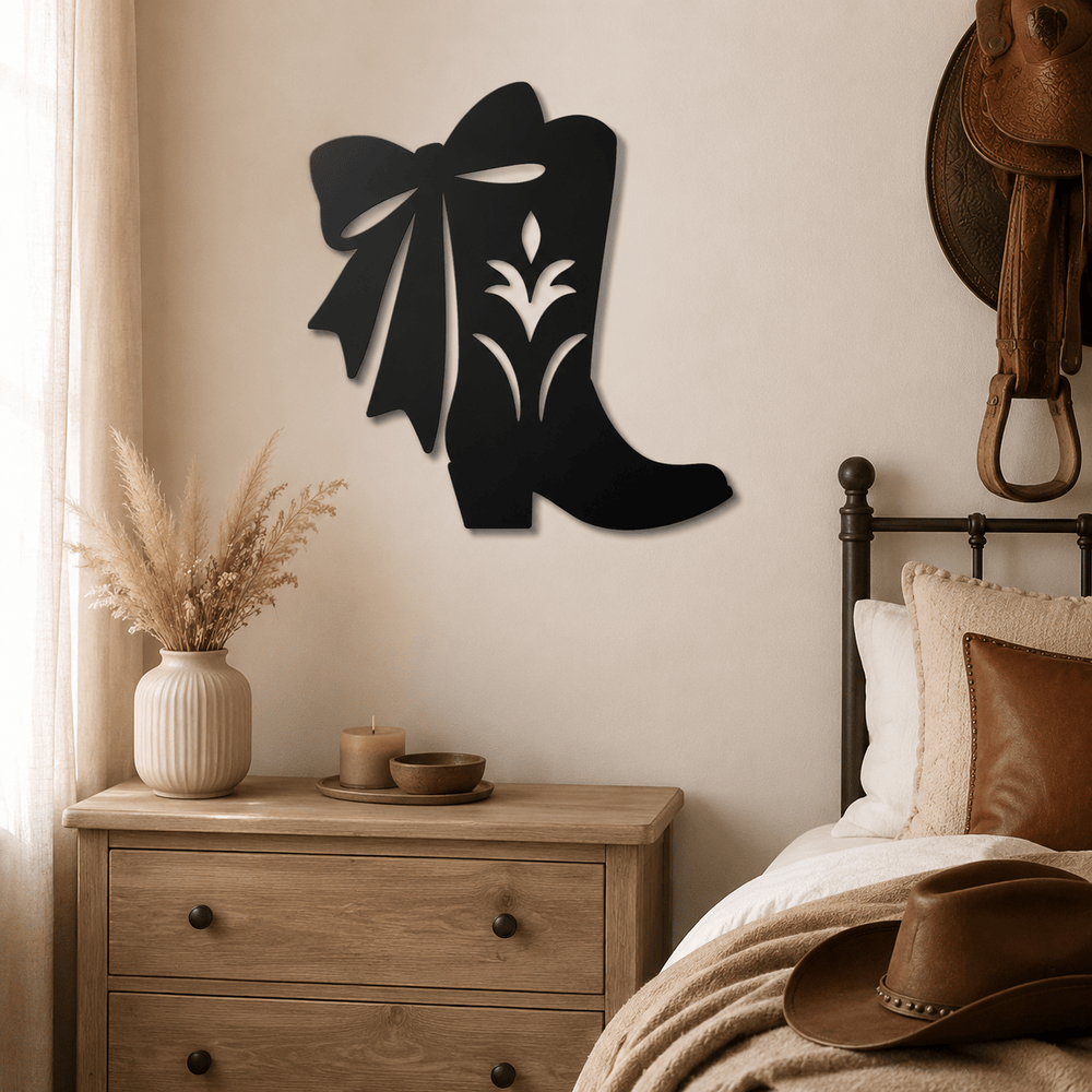 Matte Black D73 cowgirl boot and bow wall sign displayed in a Western bedroom