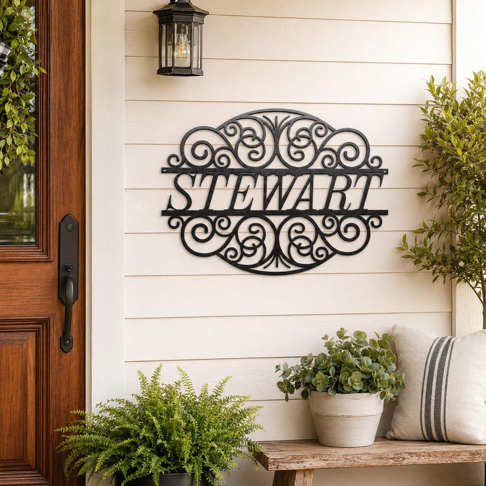 Personalized STEWART scrollwork metal sign displayed on a warm gallery wall