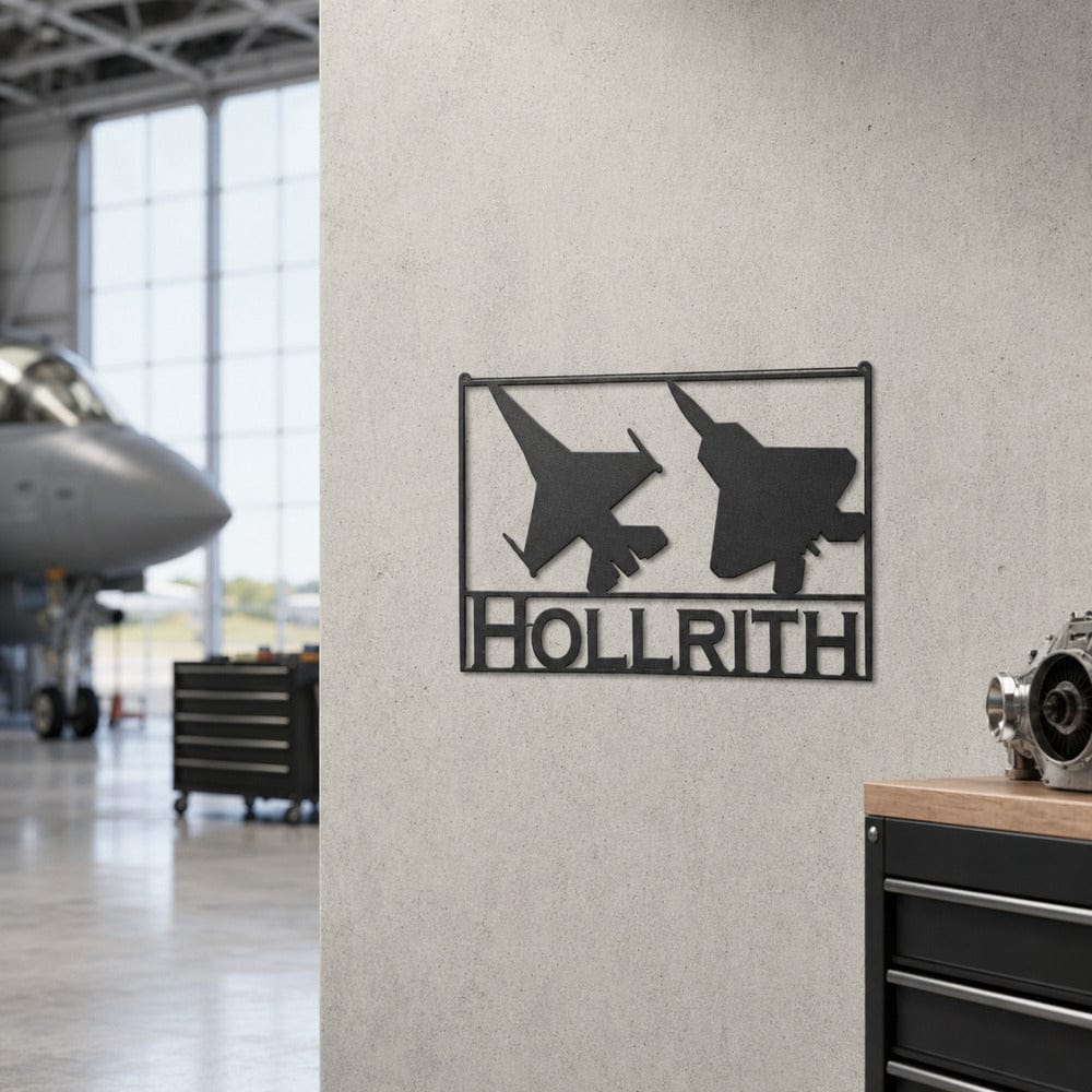 Personalized F-16 and F-22 fighter jet metal sign displayed inside an aircraft hangar