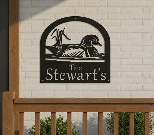 Wood duck sign on front porch wall - zoomed in 10%